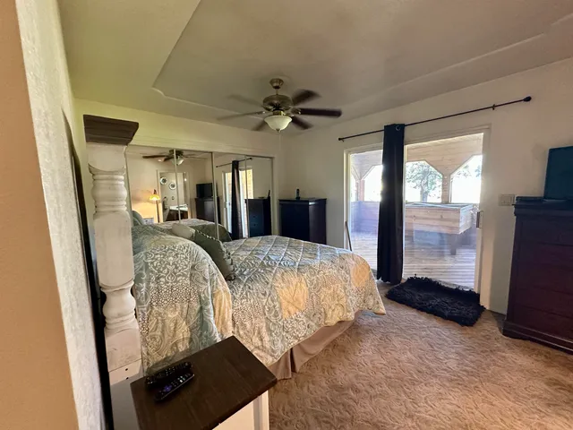 a backyard of a house with seating space