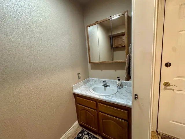 a view of a car and car in garage