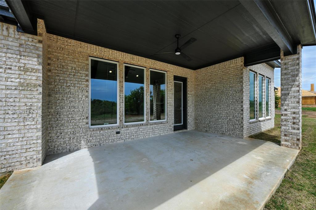 1012 Freedom Court Weatherford, TX 76088 - Photo 36 of 38 a view of a porch with seating space