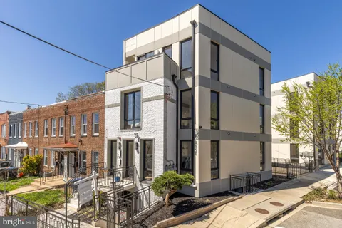 a front view of a building with street view