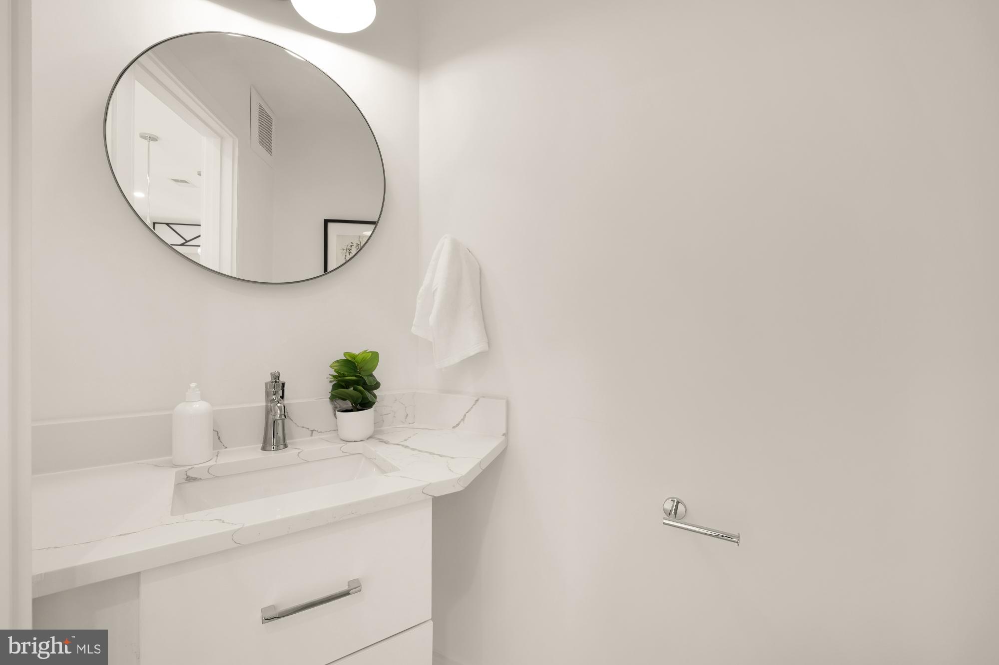 1850 Capitol Avenue Northeast Washington, DC 20002 - Photo 12 of 39 a bathroom with a sink and a mirror