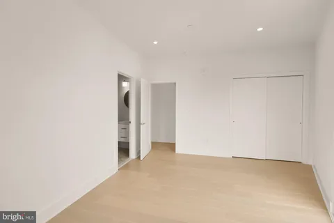 a view of a room with a large window