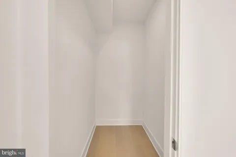 a view of a swimming pool and an outdoor seating