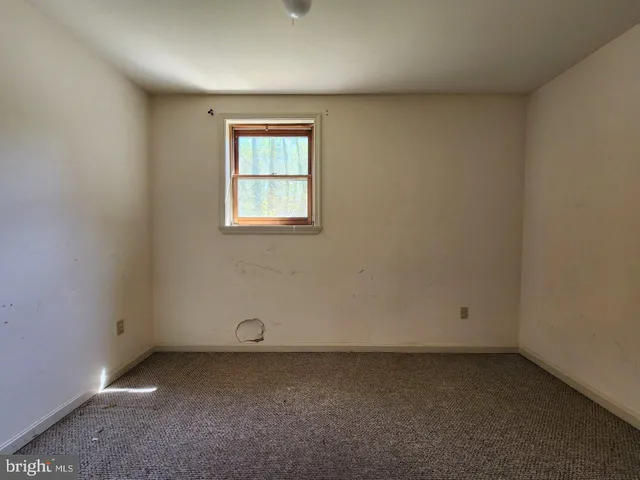 an empty room with a window