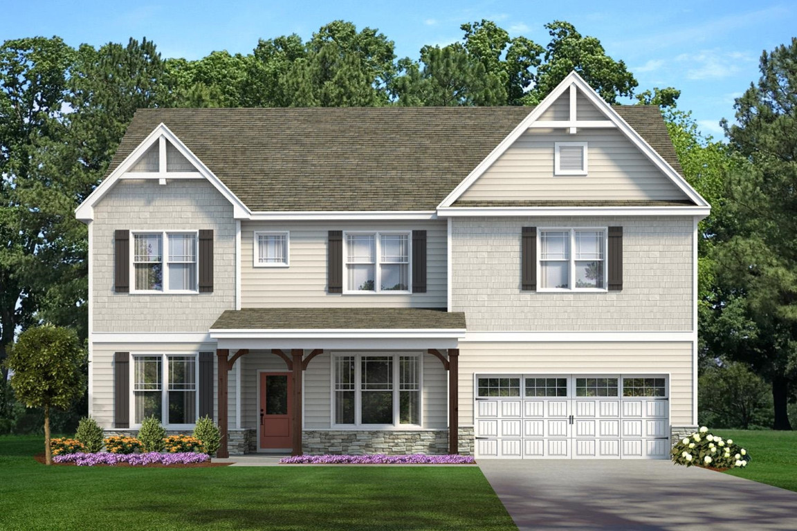 761 Scenic Pond Way Rolesville, NC 27571 - Photo 1 of 4 a front view of a house with garden