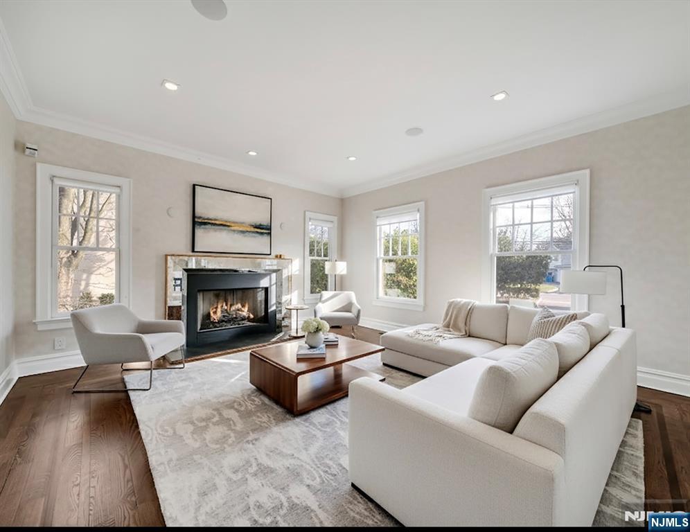 187 Buckingham Road Tenafly, NJ 07670 - Photo 11 of 50 a living room with furniture and a fireplace