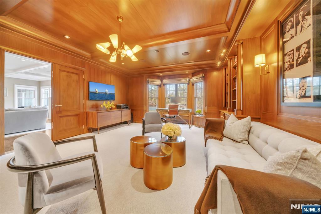 187 Buckingham Road Tenafly, NJ 07670 - Photo 14 of 50 a outdoor living with furniture and a chandelier