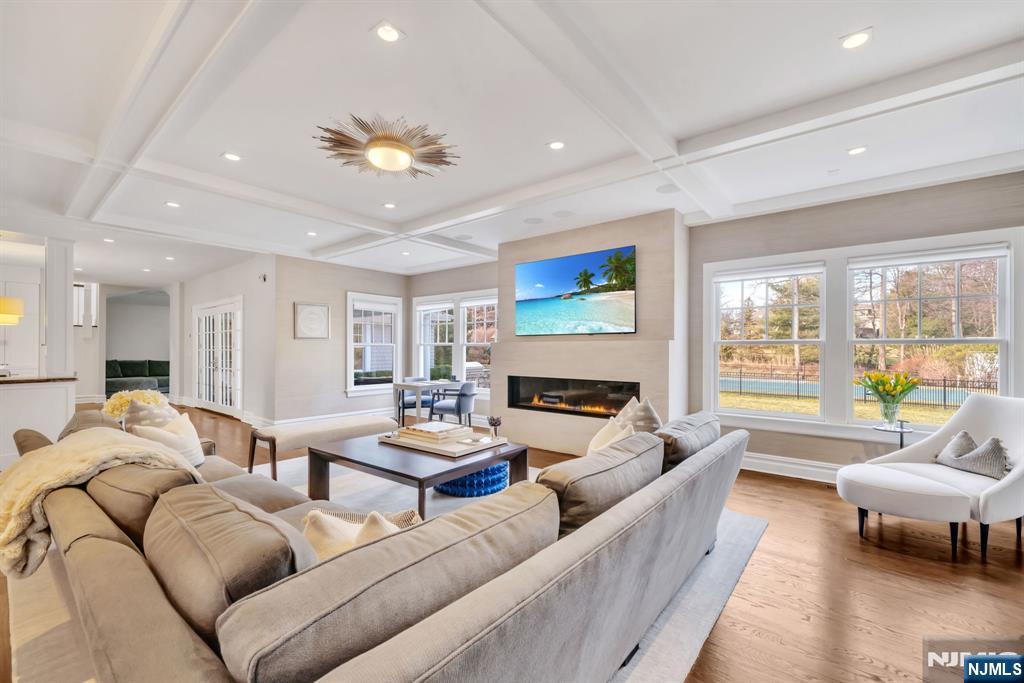 187 Buckingham Road Tenafly, NJ 07670 - Photo 16 of 50 a living room with furniture kitchen view and a large window