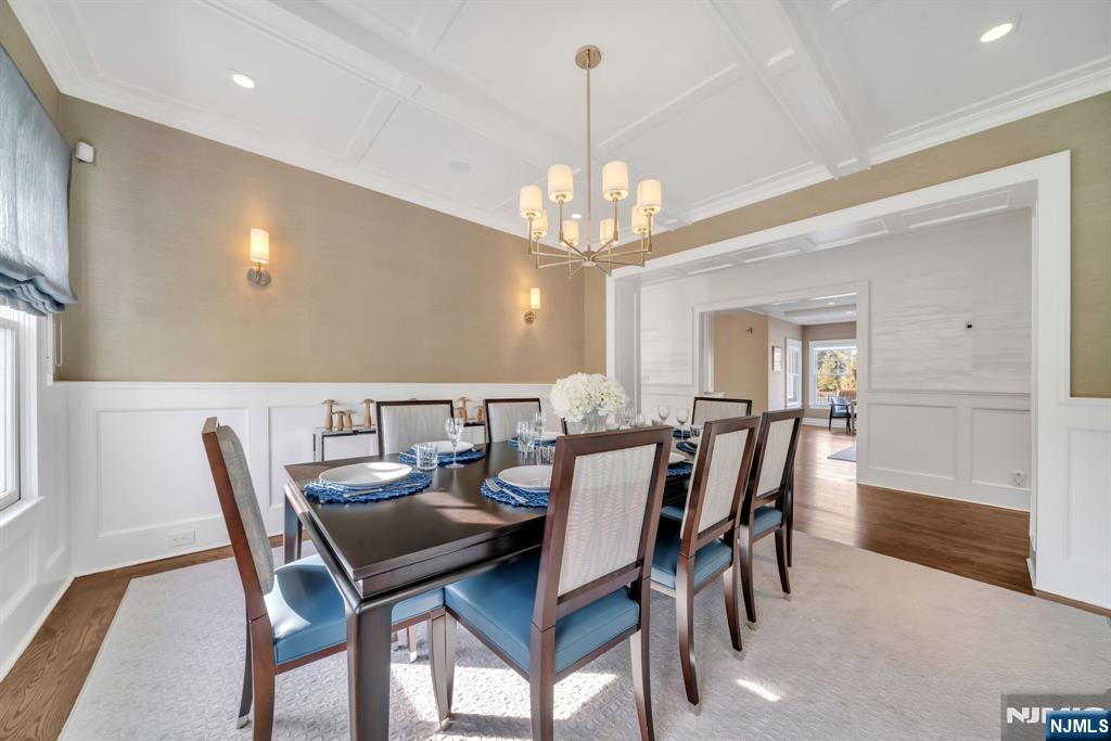 187 Buckingham Road Tenafly, NJ 07670 - Photo 18 of 50 a view of a dining room with furniture and chandelier