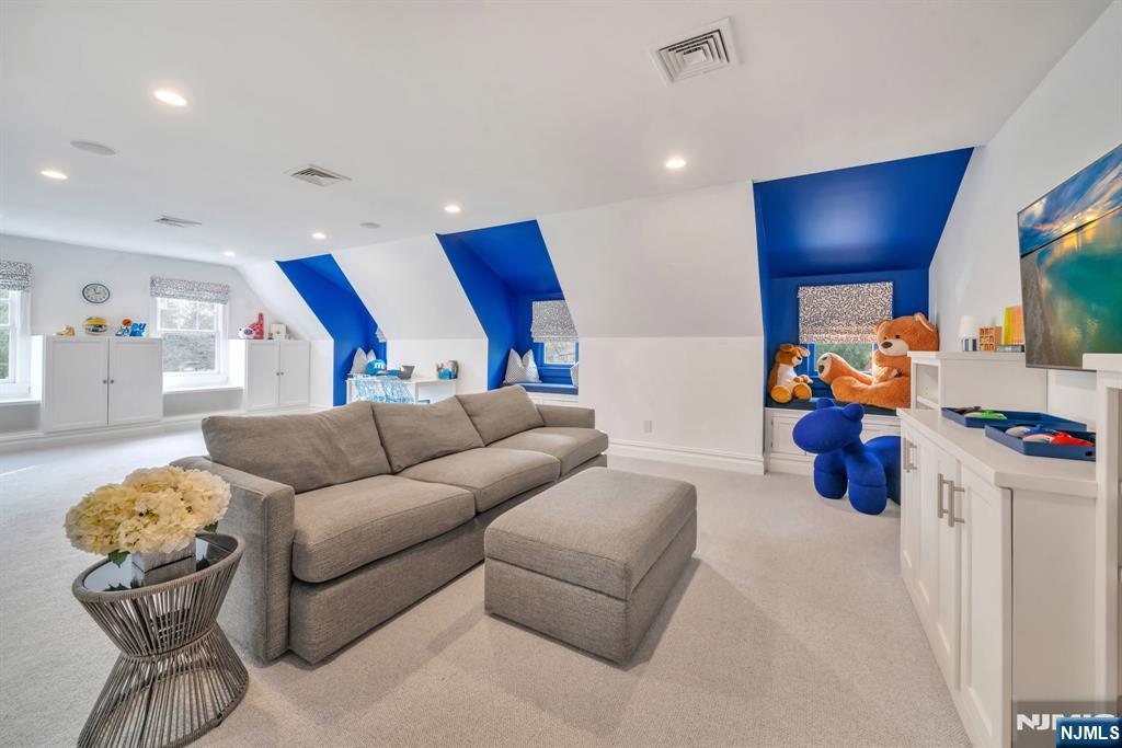 187 Buckingham Road Tenafly, NJ 07670 - Photo 38 of 50 a living room with furniture and kitchen view