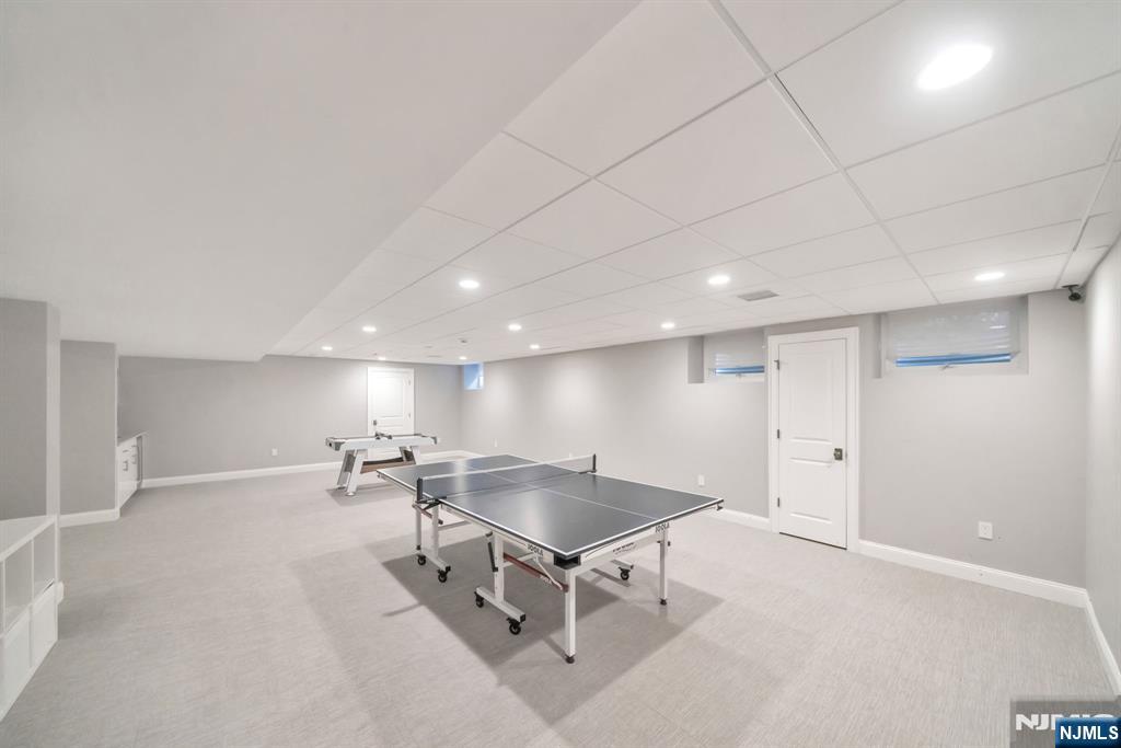 187 Buckingham Road Tenafly, NJ 07670 - Photo 42 of 50 a large room with gym equipment