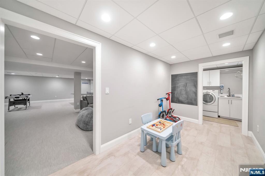 187 Buckingham Road Tenafly, NJ 07670 - Photo 45 of 50 a room with furniture and a table