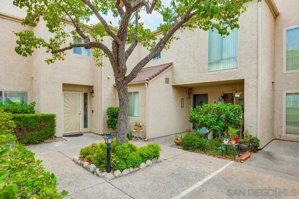 23667 Country Villa Road Ramona, CA 92065 - Photo 1 of 25 a front view of a house with garden