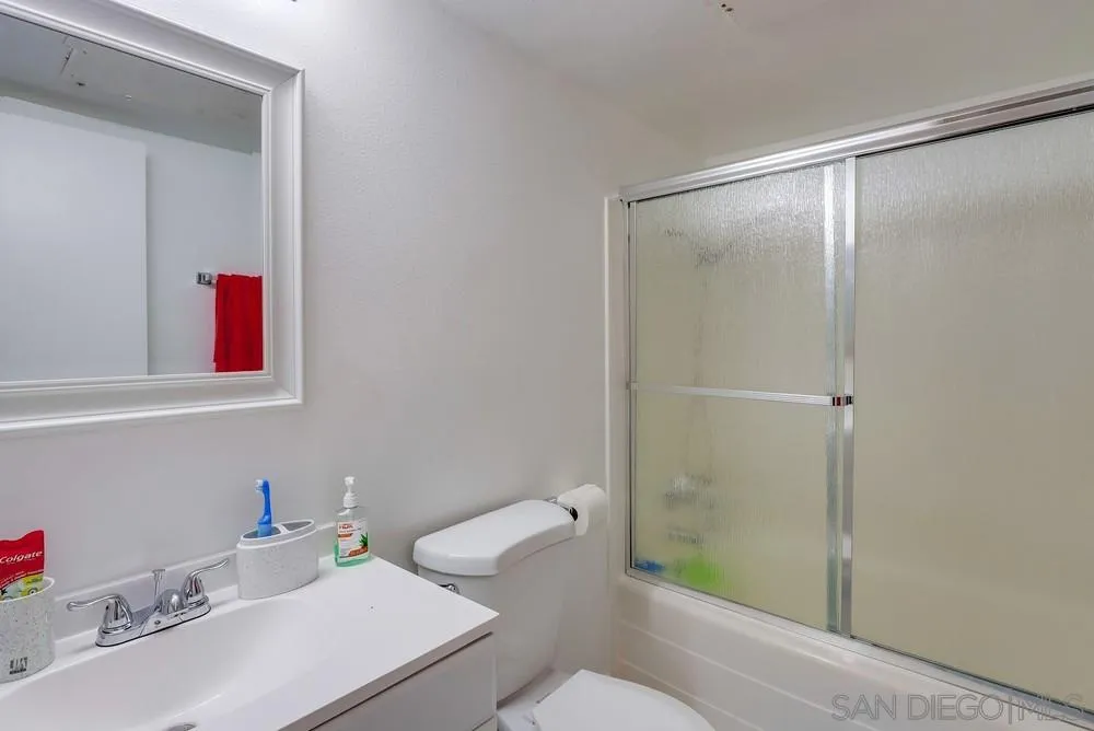 23667 Country Villa Road Ramona, CA 92065 - Photo 17 of 25 a bathroom with a sink toilet and shower