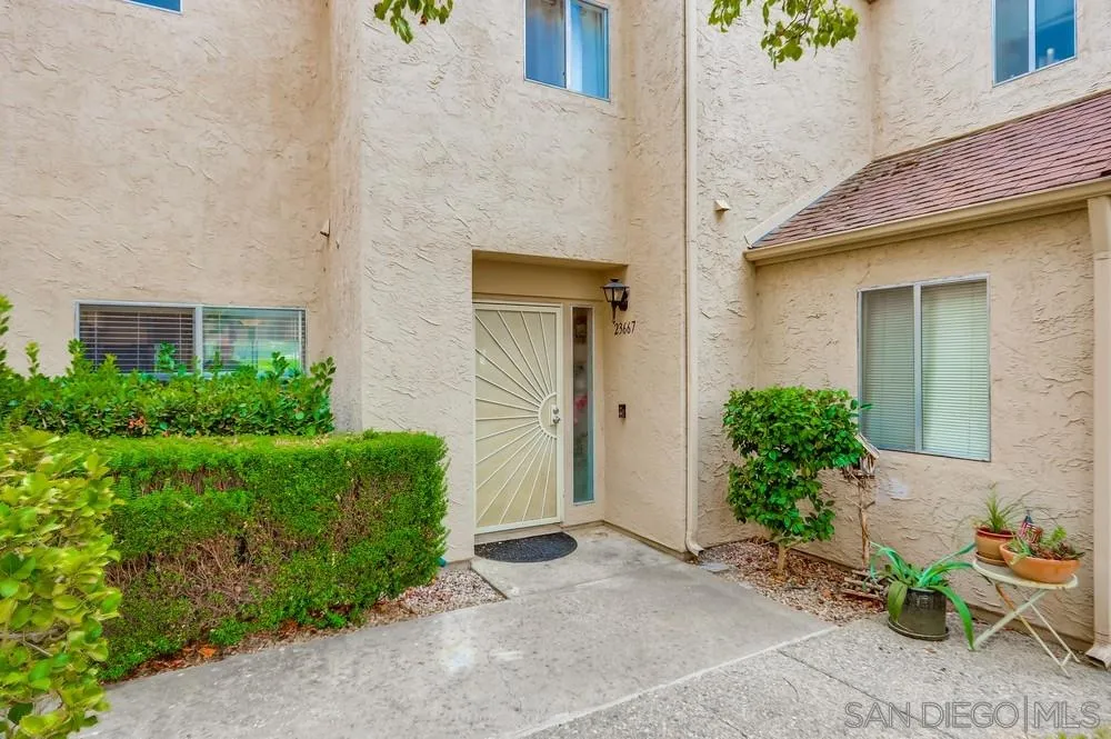 23667 Country Villa Road Ramona, CA 92065 - Photo 2 of 25 front view of a house with a yard