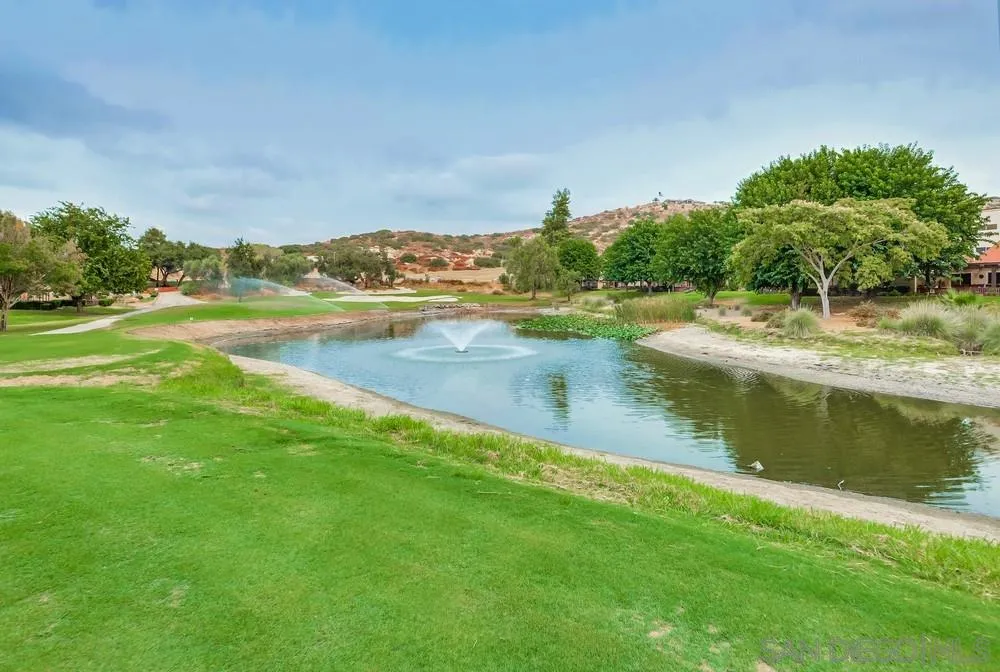 23667 Country Villa Road Ramona, CA 92065 - Photo 22 of 25 a view of a lake with houses in the back