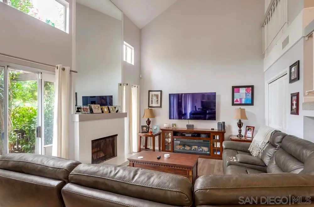23667 Country Villa Road Ramona, CA 92065 - Photo 7 of 25 a living room with furniture and a fireplace