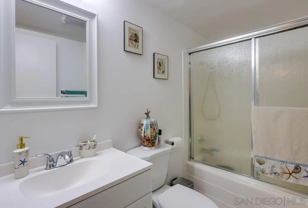 23667 Country Villa Road Ramona, CA 92065 - Photo 9 of 25 a bathroom with a sink toilet and shower