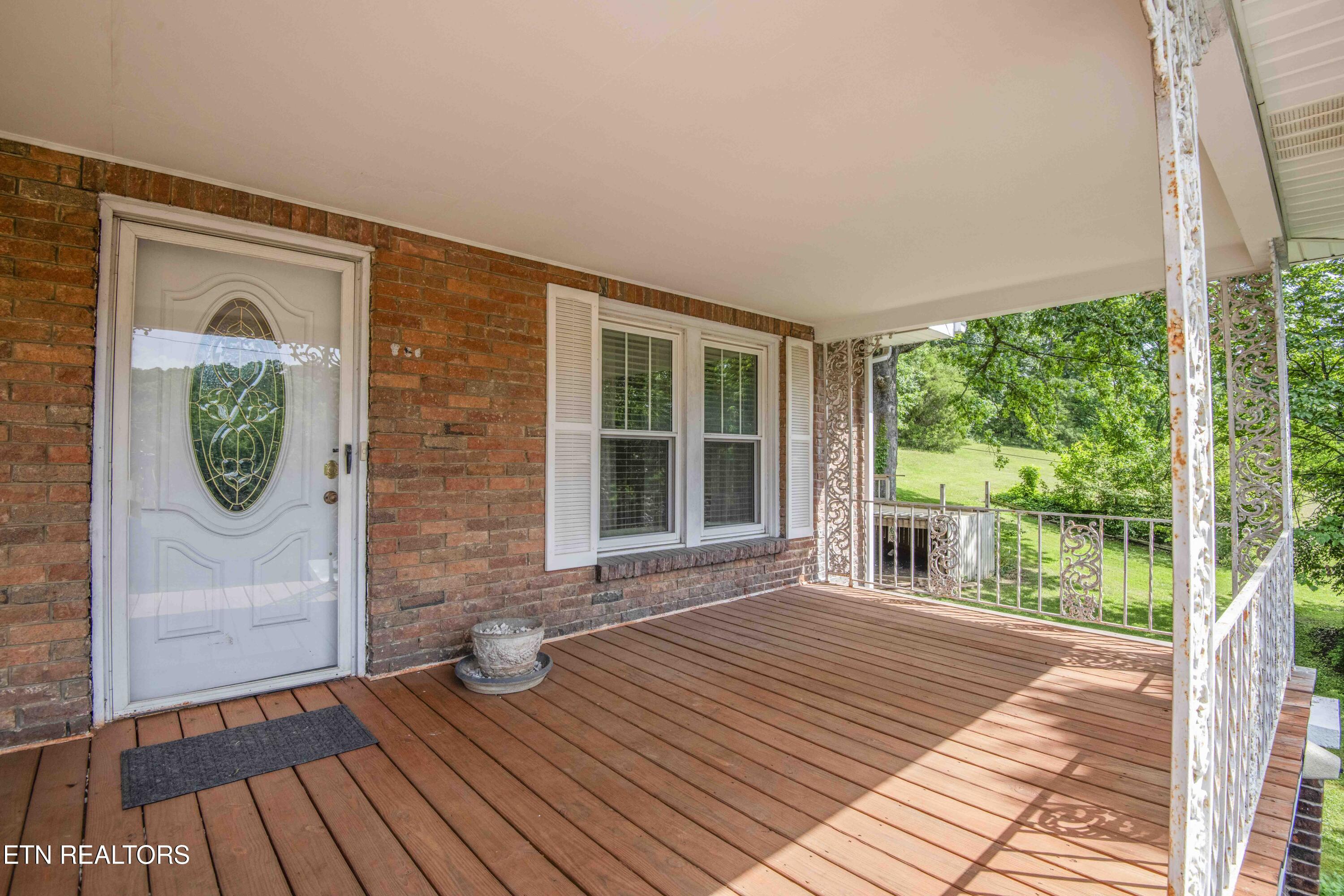 17761 Alberta Street Oneida, TN 37841 - Photo 7 of 56 front porch 1_1