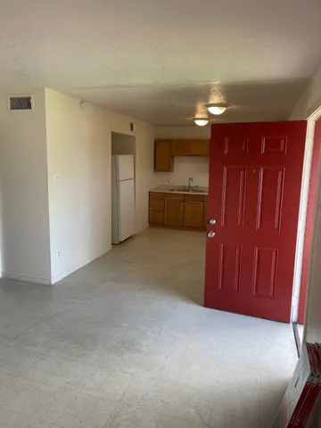 a view of a livingroom with furniture
