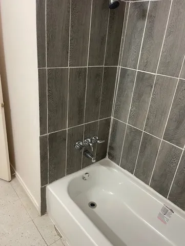 a bathroom with a bathtub