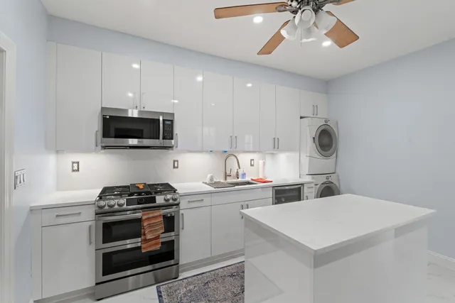 a room with a dresser and a mirror