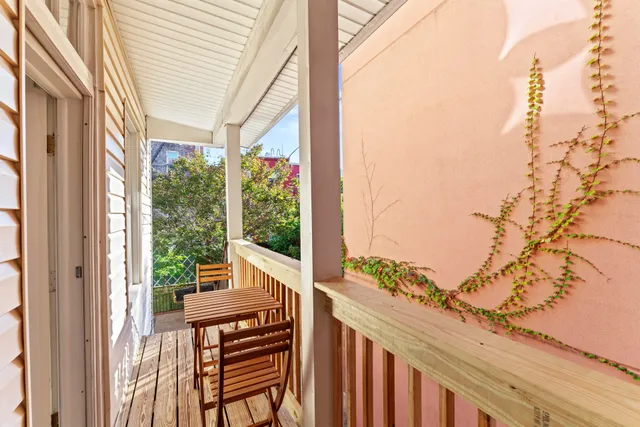 a view of a kitchen with sink washer and dryer