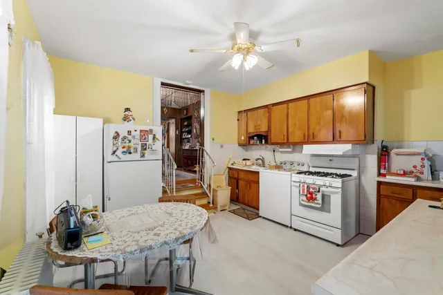a view of a tables and chairs in a patio