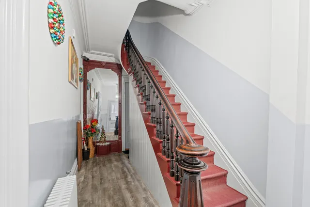 an aerial view of a house with a yard lake view and mountain view