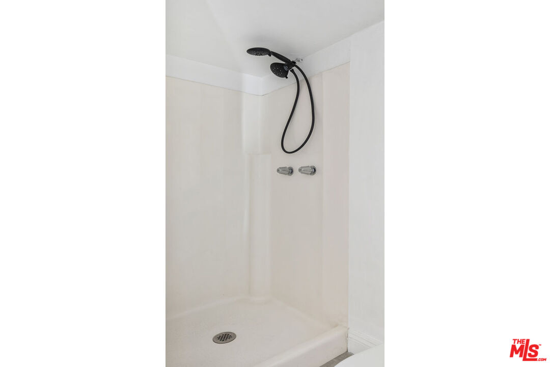 3922 Edison Walk Los Angeles, CA 90032 - Photo 20 of 26 a bathroom with a shower