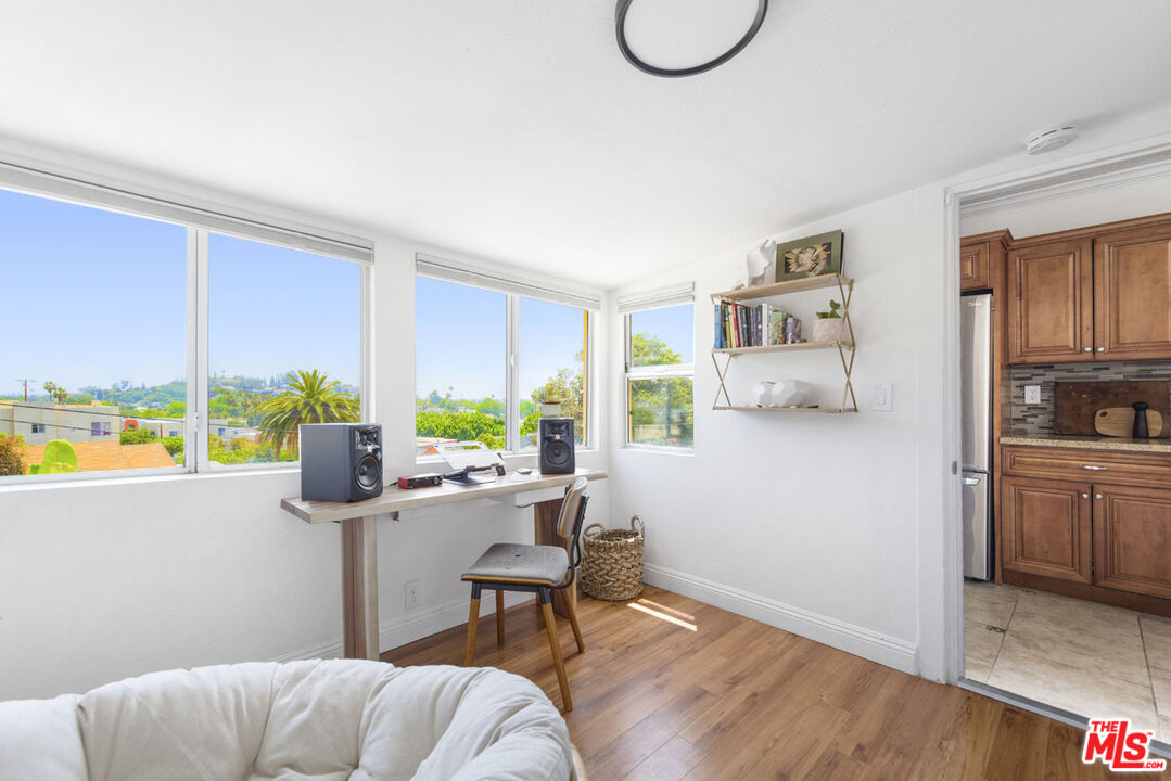 3922 Edison Walk Los Angeles, CA 90032 - Photo 9 of 26 a living room with furniture and a window