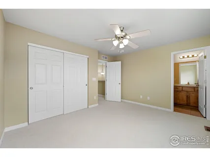 a view of an empty room with a bathroom