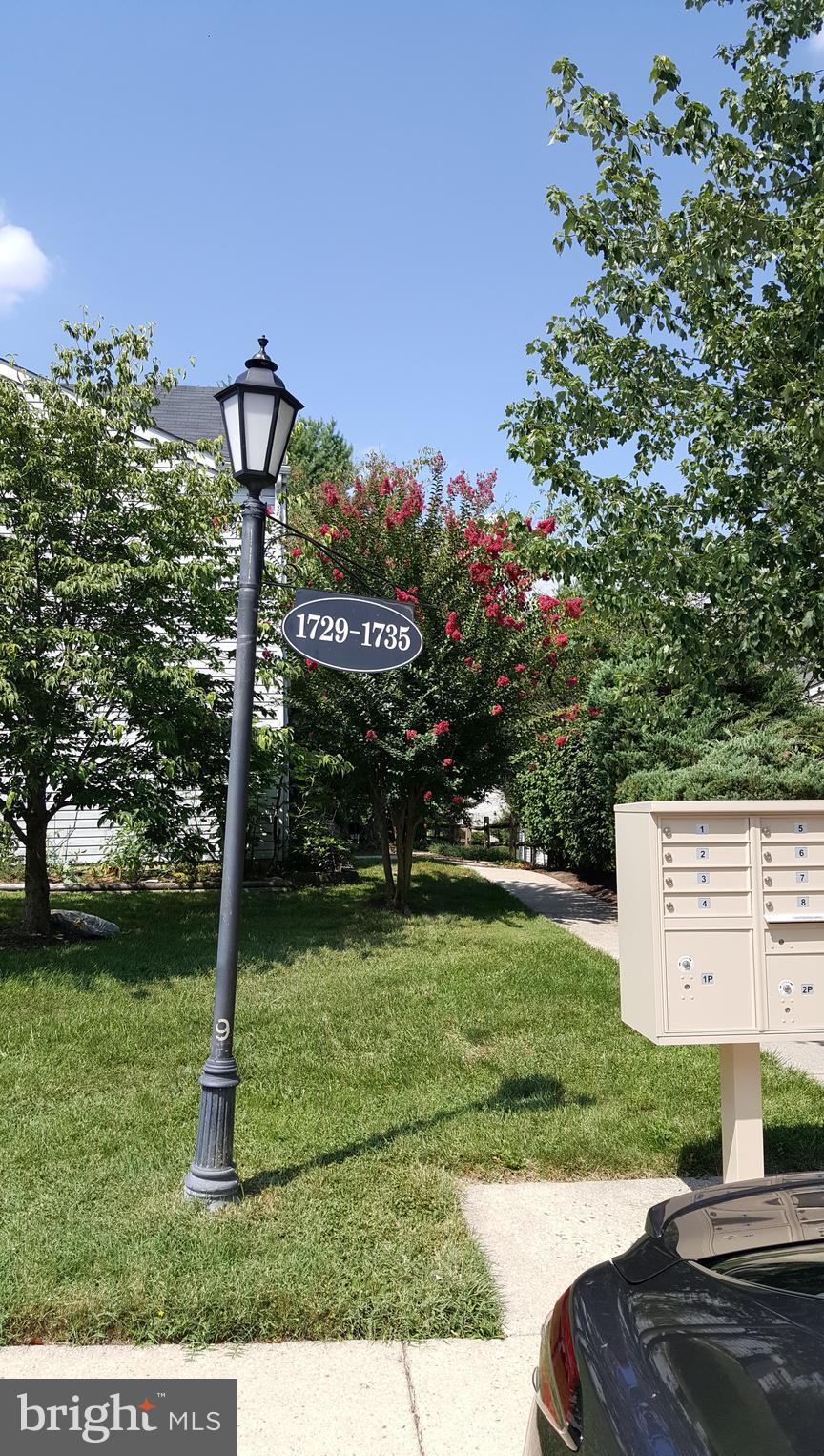 1731 Wilcox Lane Silver Spring, MD 20906 - Photo 28 of 29 past the mailboxes & down the walkway to 1731