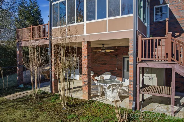 a view of a house with a iron gate