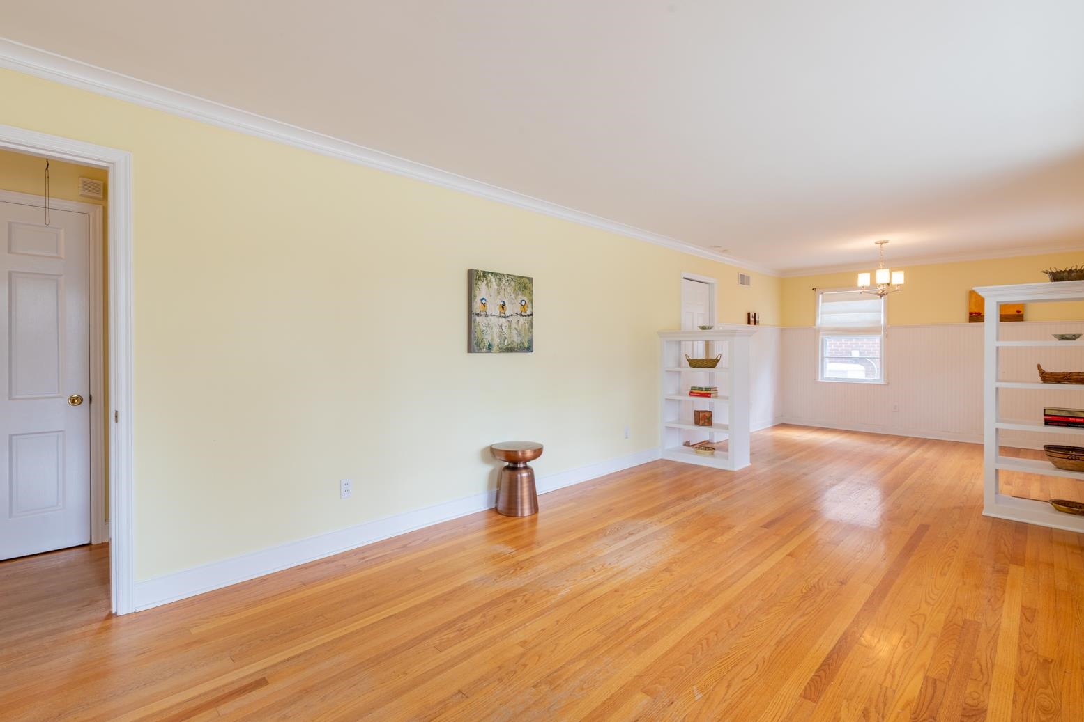 1090 Marcia Road Memphis, TN 38117 - Photo 4 of 25 a view of a livingroom with wooden floor and a staircase