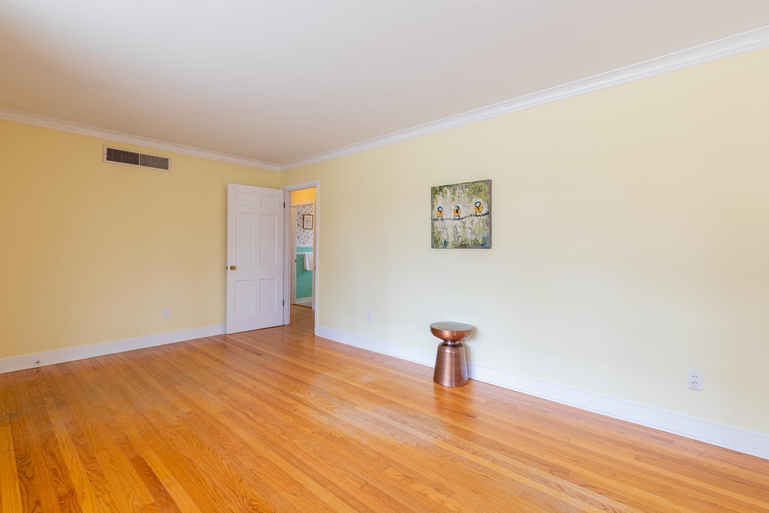 1090 Marcia Road Memphis, TN 38117 - Photo 7 of 25 a view of an empty room with wooden floor
