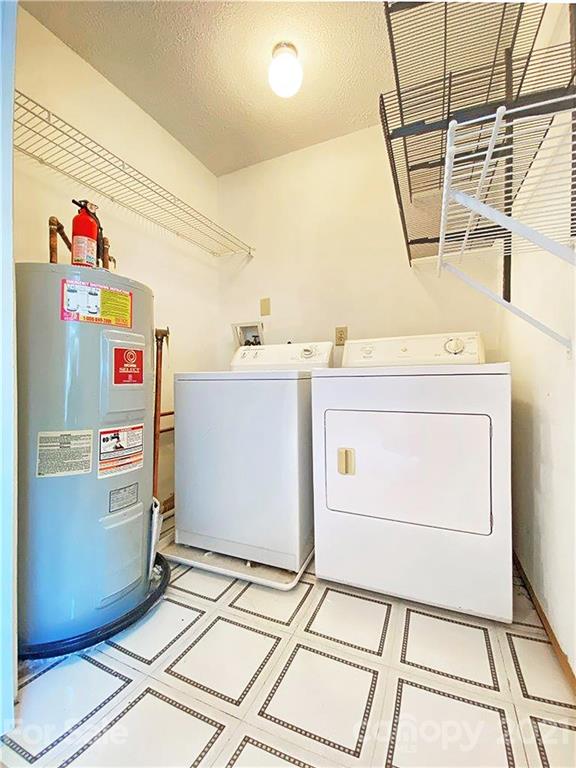 2606 Park Road Charlotte, NC 28209 - Photo 14 of 16 a utility room with dryer and washer