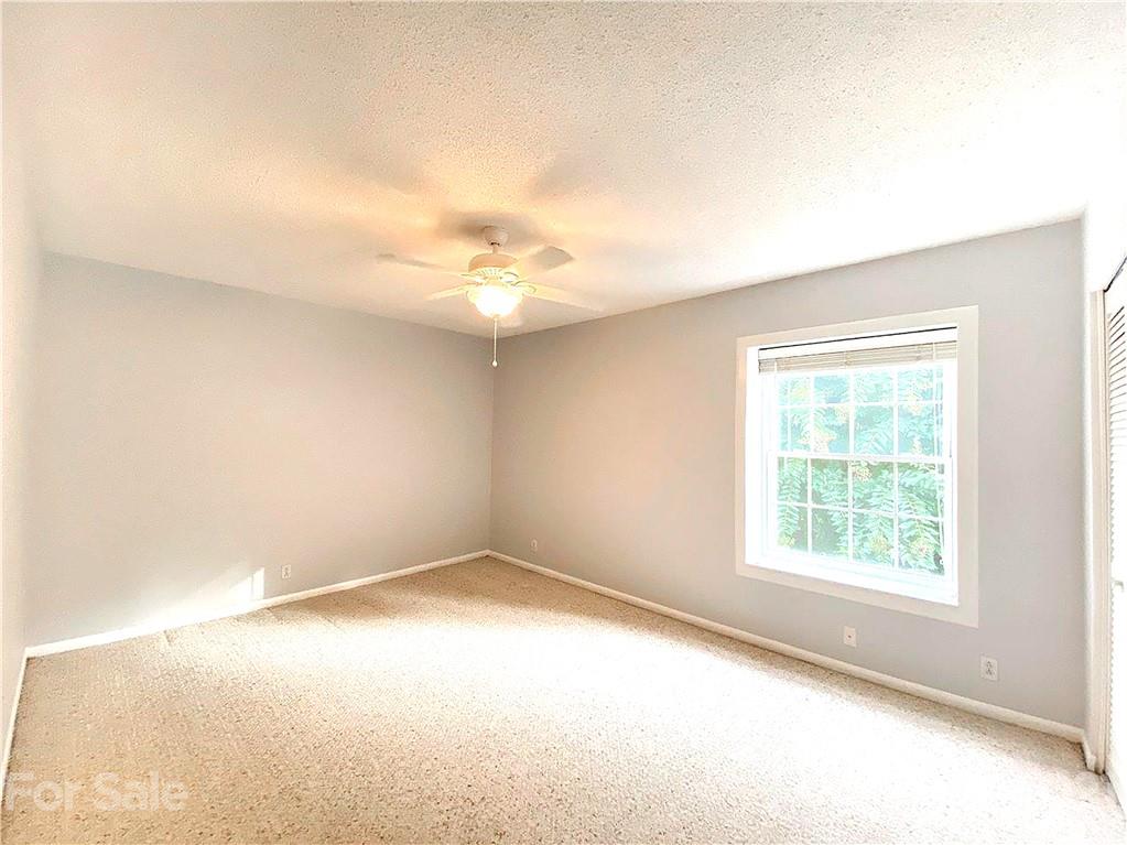 2606 Park Road Charlotte, NC 28209 - Photo 10 of 16 an empty room with windows