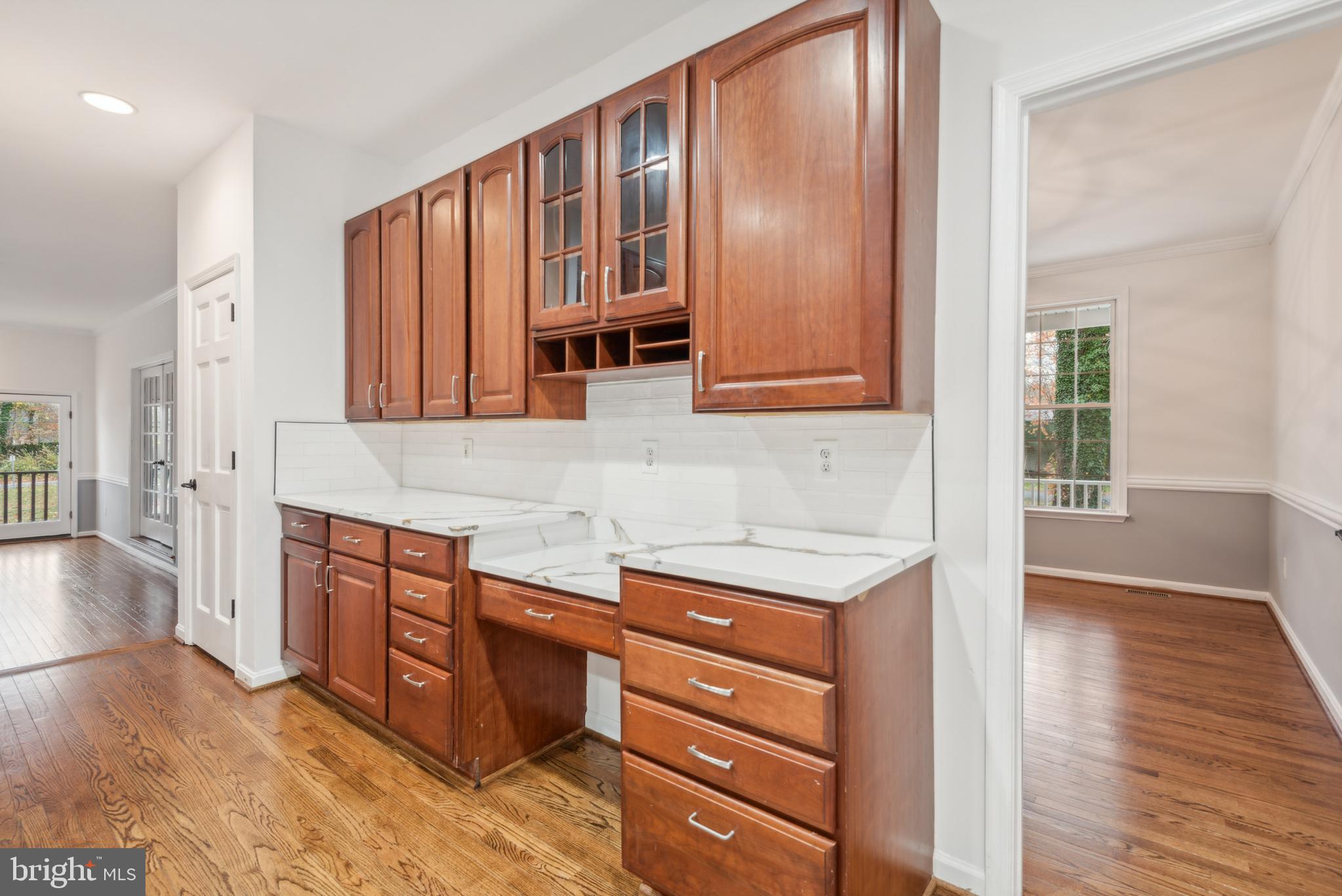 1825 Johnson Road Annapolis, MD 21409 - Photo 15 of 44 a kitchen with stainless steel appliances granite countertop a stove and a wooden cabinets