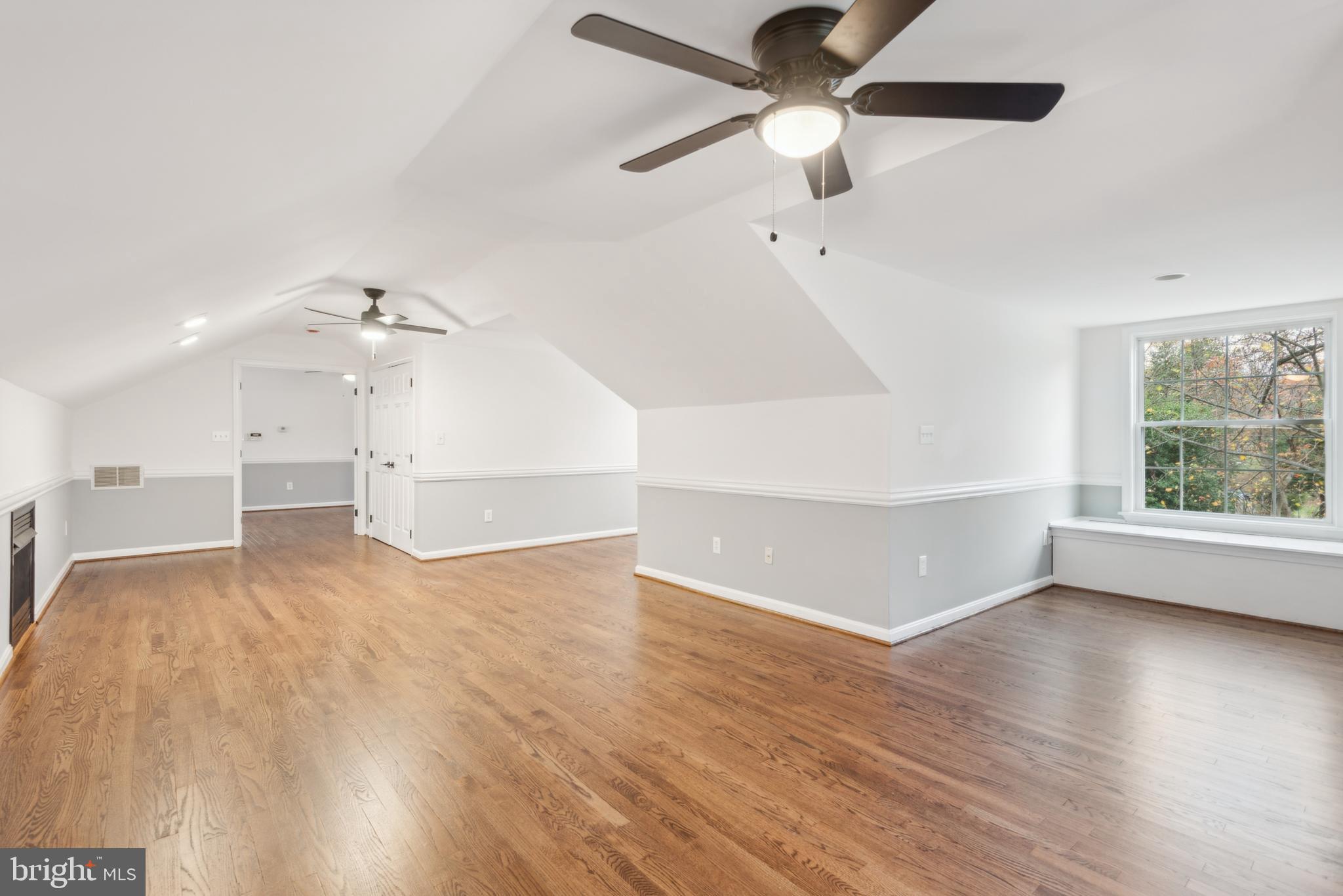 1825 Johnson Road Annapolis, MD 21409 - Photo 21 of 44 a view of empty room with wooden floor and fan