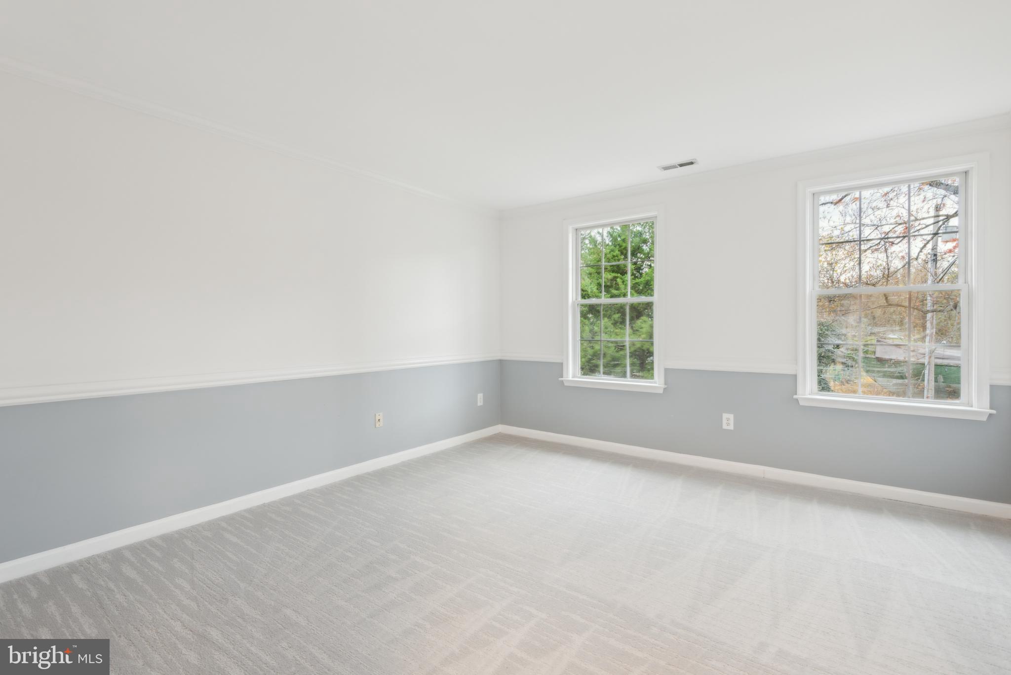 1825 Johnson Road Annapolis, MD 21409 - Photo 25 of 44 an empty room with windows