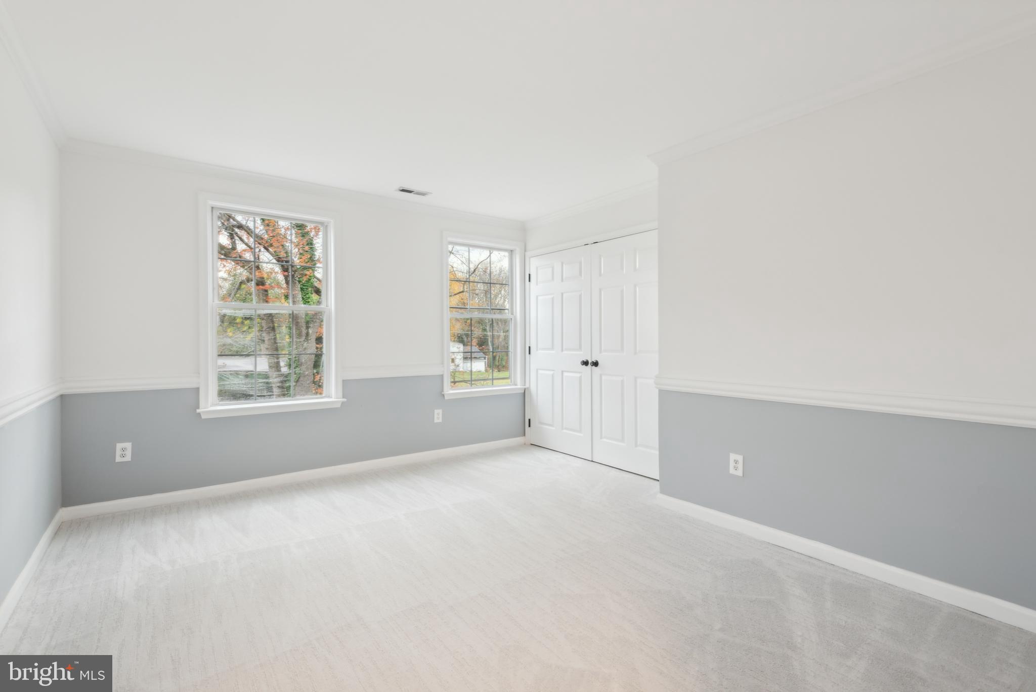 1825 Johnson Road Annapolis, MD 21409 - Photo 26 of 44 an empty room with windows and closet