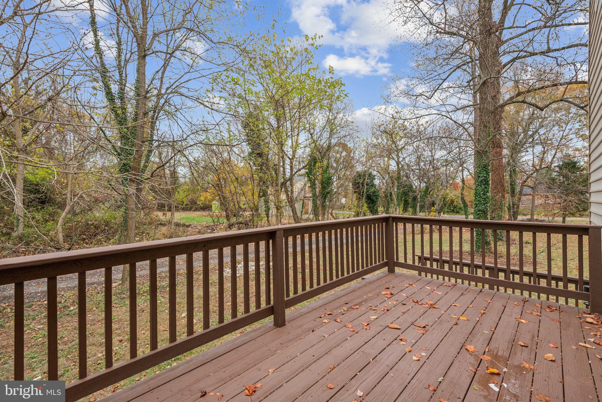 1825 Johnson Road Annapolis, MD 21409 - Photo 37 of 44 a balcony with wooden floor and trees