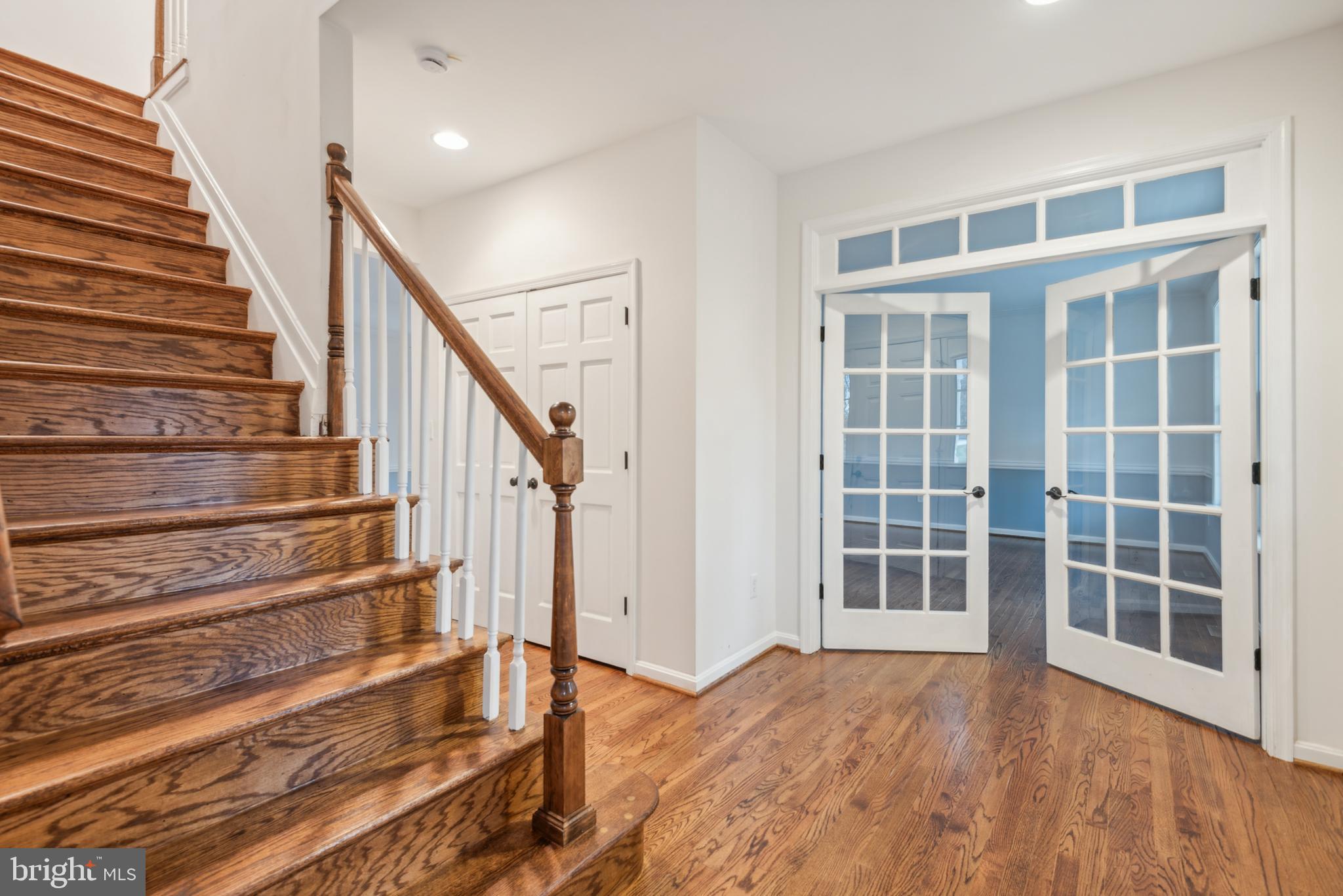 1825 Johnson Road Annapolis, MD 21409 - Photo 4 of 44 a view of entryway with wooden floor and stairs
