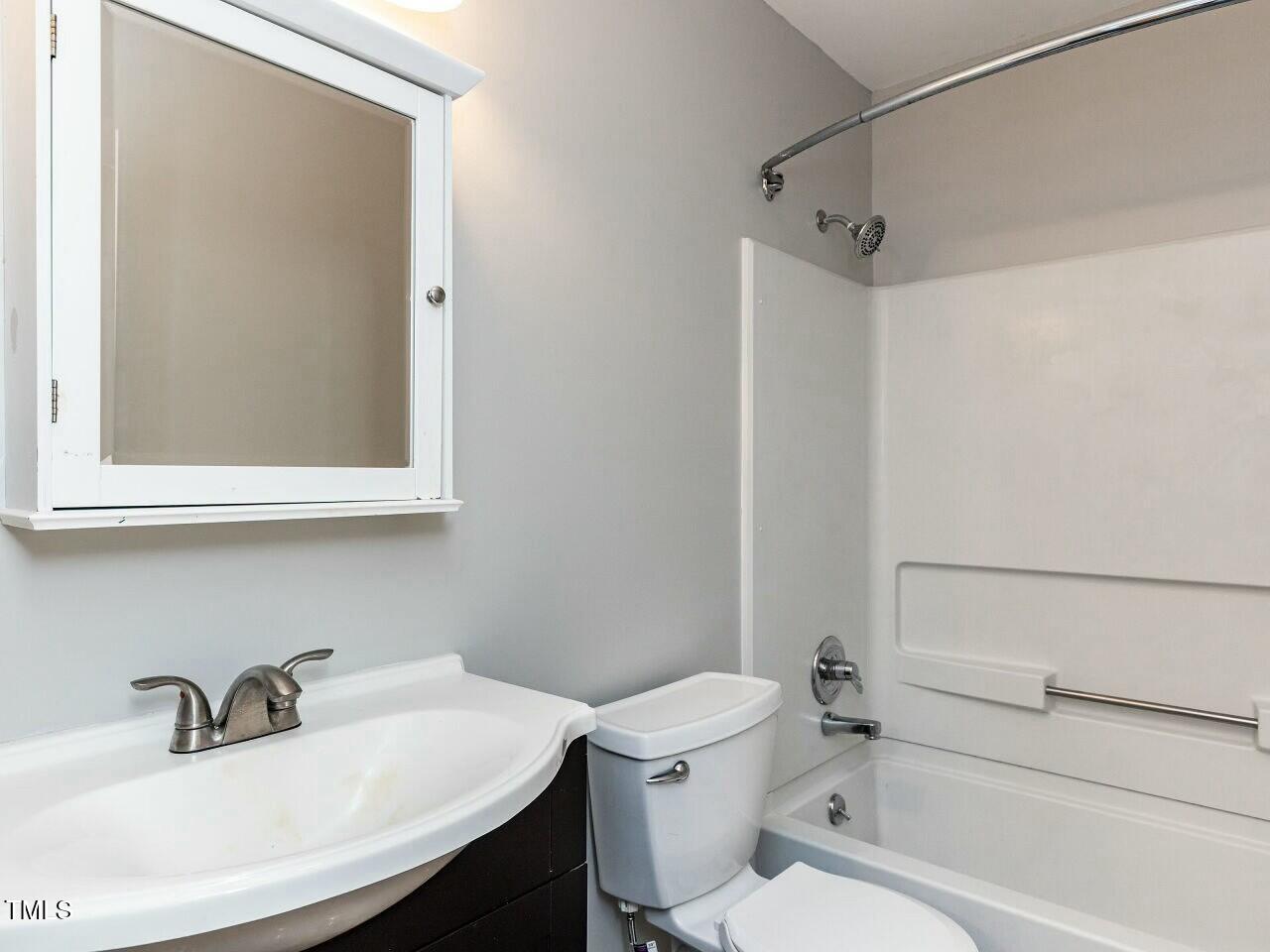 116 Old Maple Lane Durham, NC 27713 - Photo 22 of 30 a bathroom with a sink toilet and shower