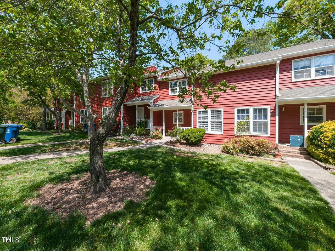 116 Old Maple Lane Durham, NC 27713 - Photo 3 of 30 a front view of a house with a yard