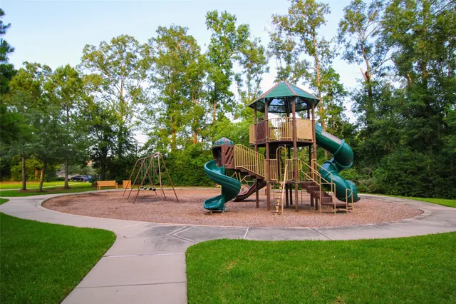 a view of a street with a parked cars