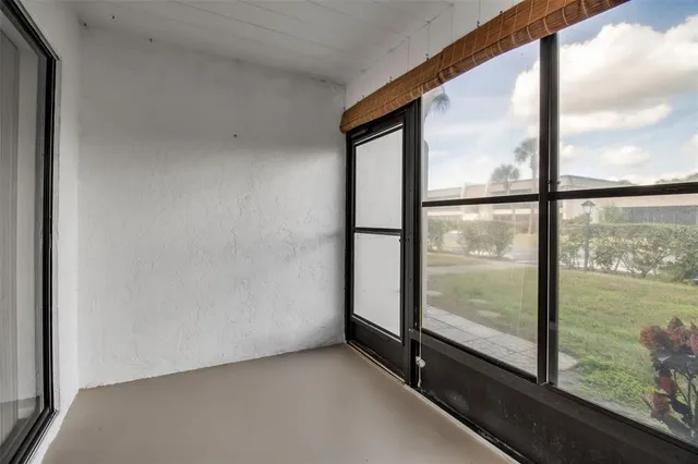 a view of hallway with furniture