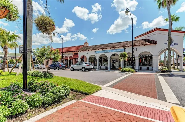 a view of a chairs and table in patio