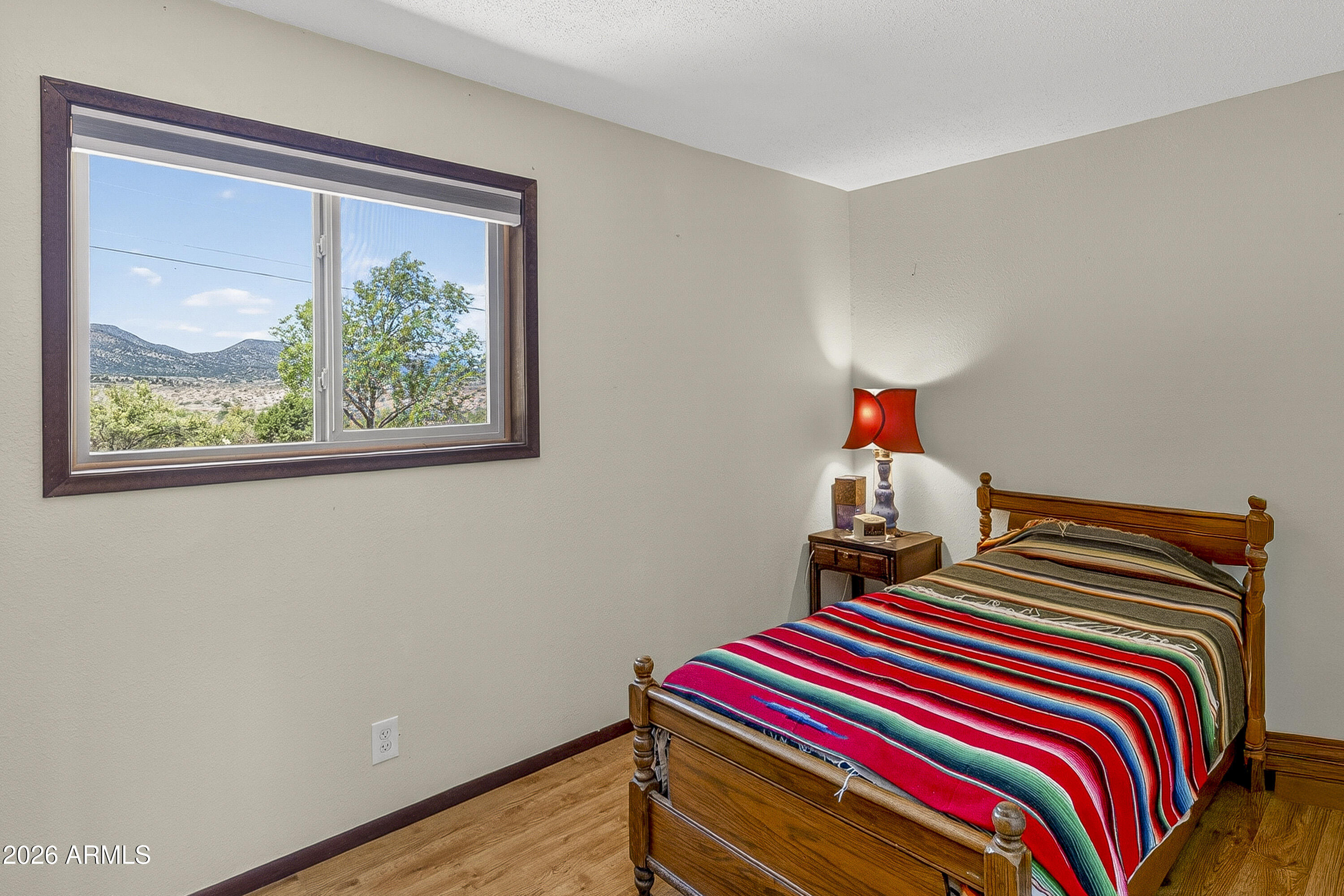633 Oasis Road Camp Verde, AZ 86322 - Photo 39 of 50 a bedroom with a bed and a window